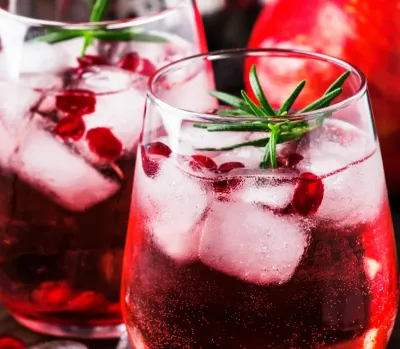 Preparing cognac based cocktails by Lise Baccara, mixing cognac with fruits and spices for an artisanal French creation
